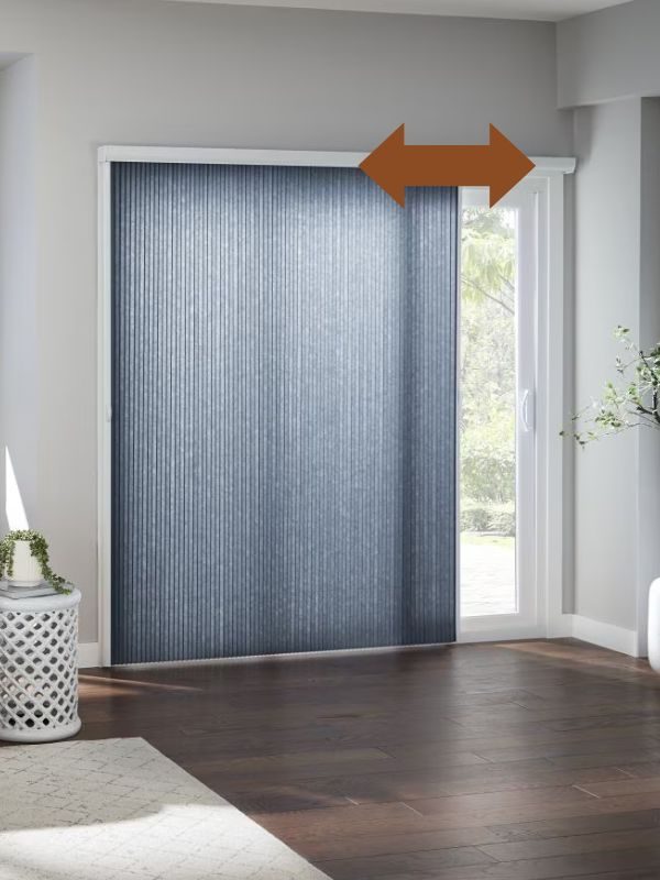 Side-stack cellular shades covering a sliding patio door in a Vancouver home