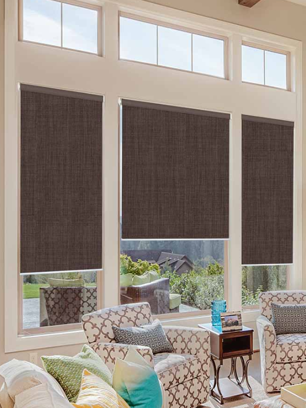 Custom blinds installed in a modern Coquitlam living room with large windows