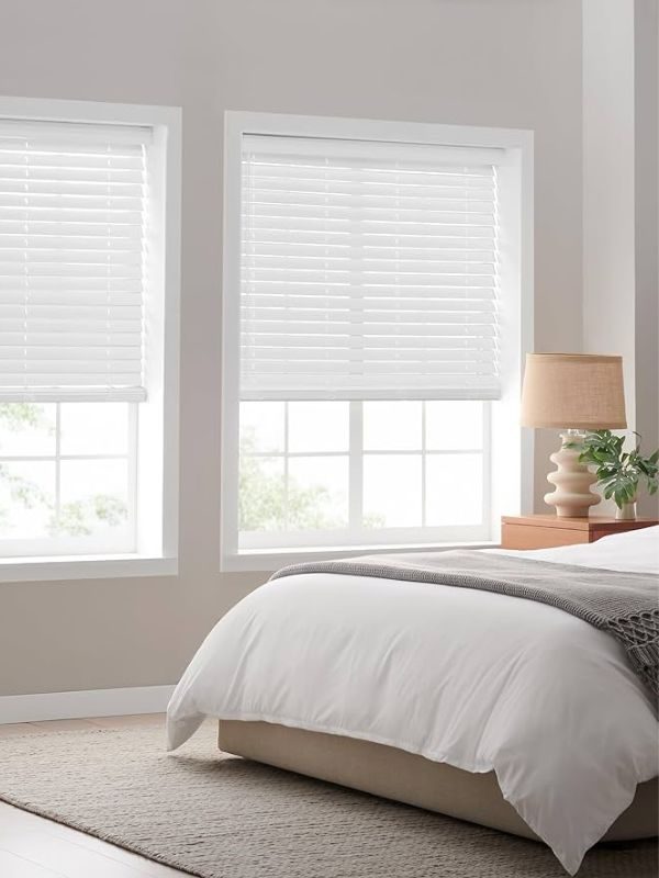 Venetian blinds in a Vancouver bedroom tilted for privacy