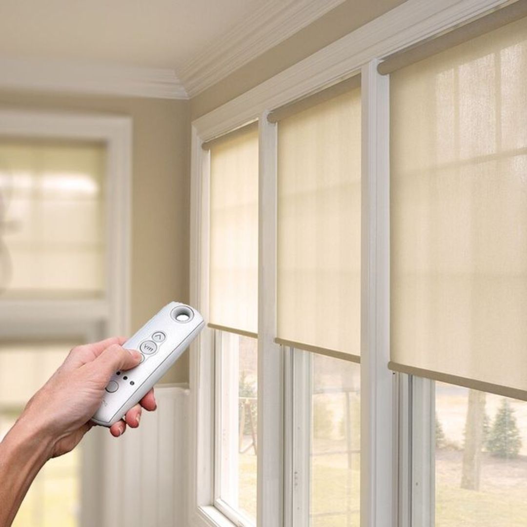 Motorized smart blinds in a modern Vancouver living room controlled by app and voice